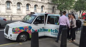 The Healthwatch Essex Chatterbox cab's passengers prepare to disembark outside Richmond House