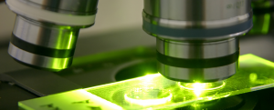 Electron microscopes shining light on a slide sample