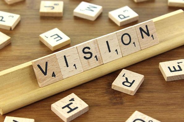 Scrabble letters spelling out the word vision