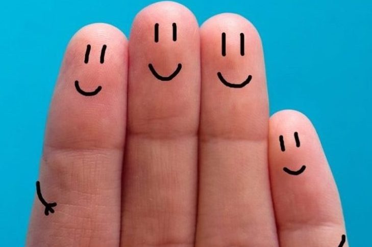Fingers with smiley faces