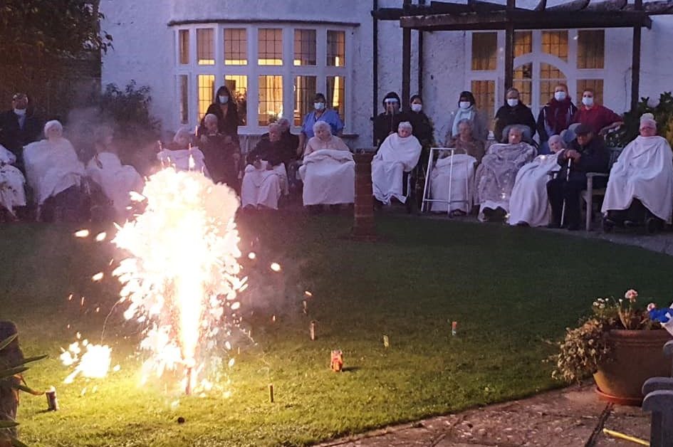 residents enjoy a fireworks display