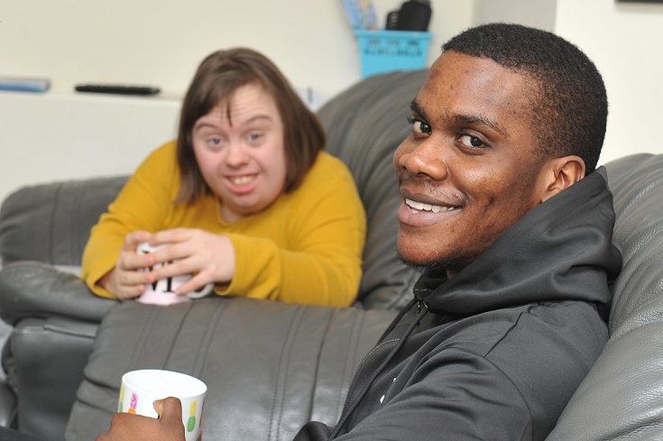 Two happy young people supported by Lifeways