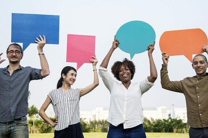 Ethnically diverse colleagues having a conversation