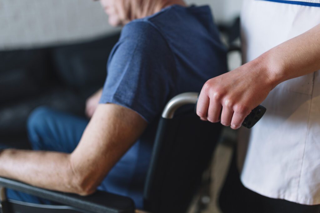 Man in wheelchair in a care home