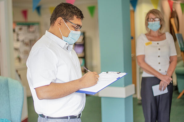 Care colleagues doing admin.