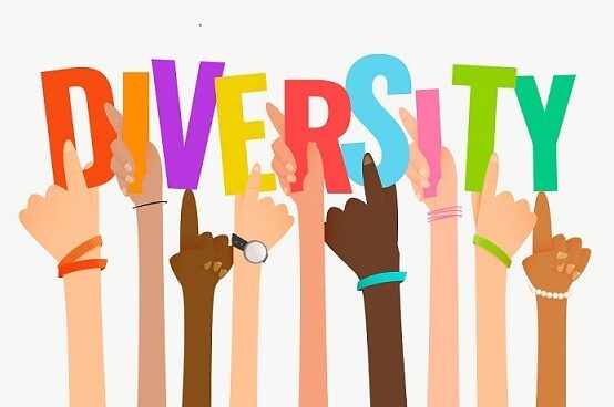 Hands holding up the word diversity