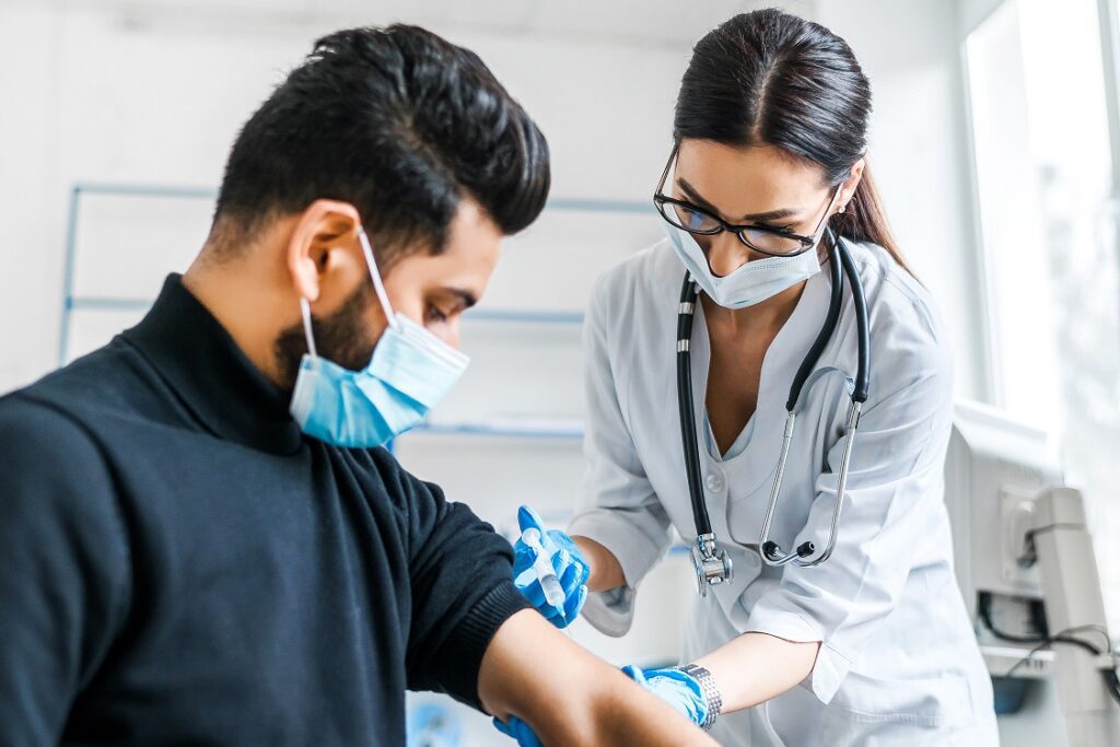 Man having flu jab