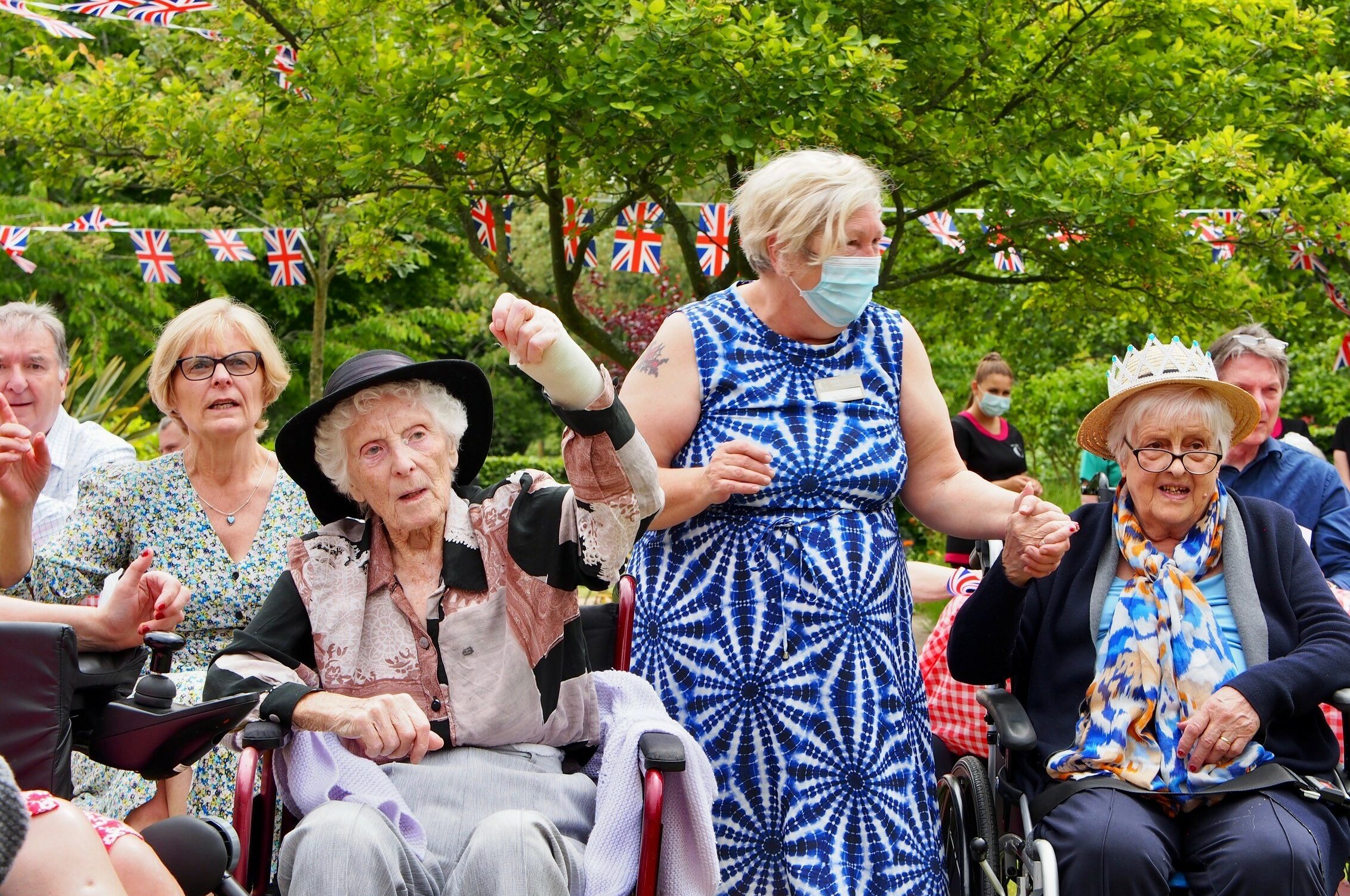 Care home residents enjoying an outdoor event for Care Home Open Week