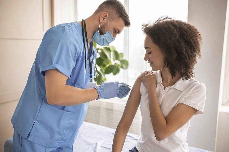doctor-vaccinating-patient