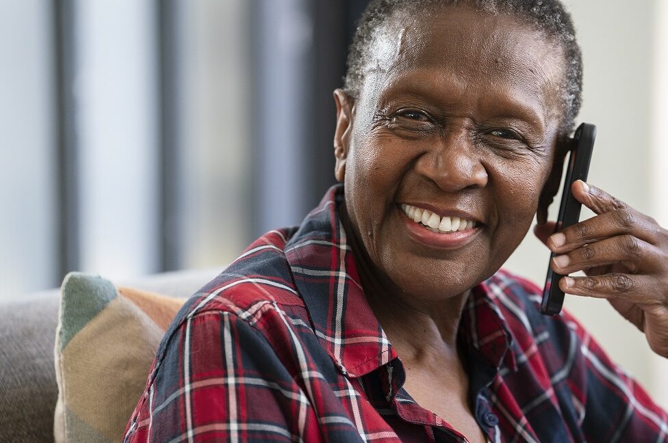 Older woman on the phone, smiling