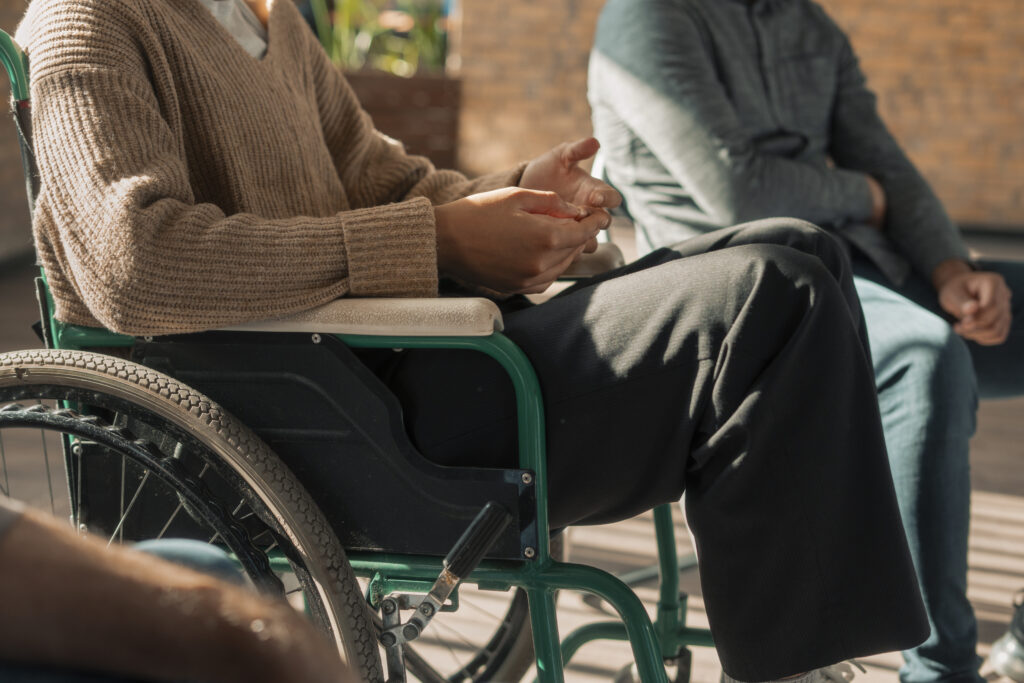 A person receiving care and support in a wheelchair 